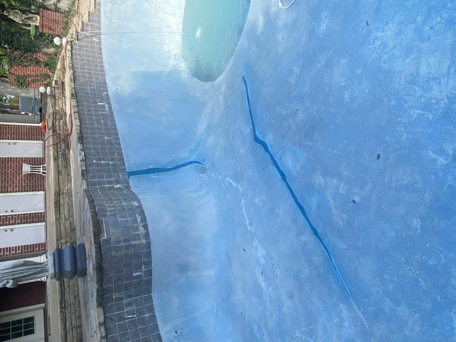 Pool shell crack requiring repair