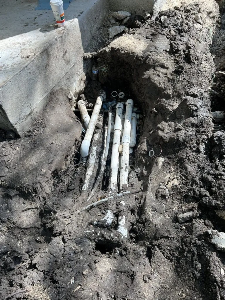 Complex underground pool piping system